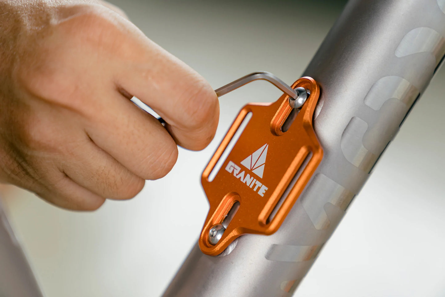 Step 2: Attach the plate with the supplied M5 bolts.